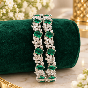 Home emerald and diamond jewelry on velvet